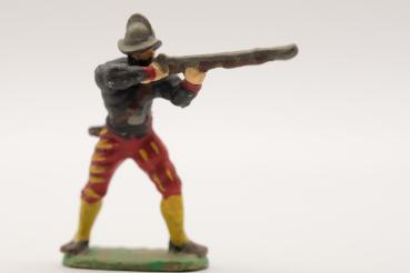 Landsknecht musketeer standing with Spanish helmet